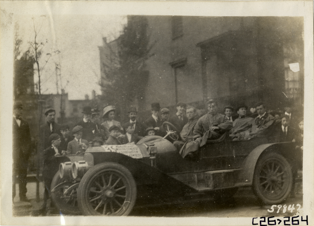 Motorists posing in automobile, 1910 New Jersey Reliability Run