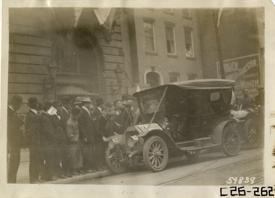 Spectators looking at automobile, 1910 New Jersey Reliability Run
