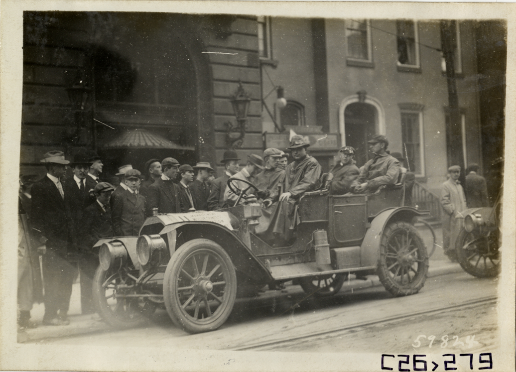 Motorists posing in automobile, 1910 New Jersey Reliability Run
