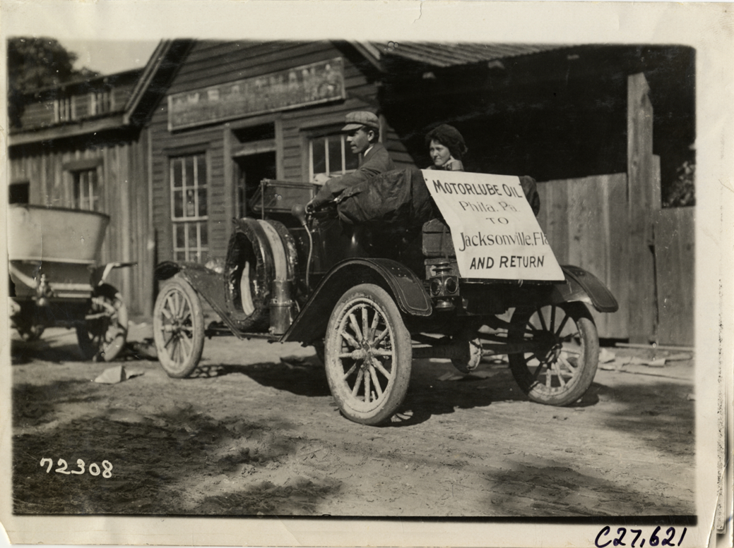 Motorists posing in automobile, 1911 Touring Club of America Good Roads Tour