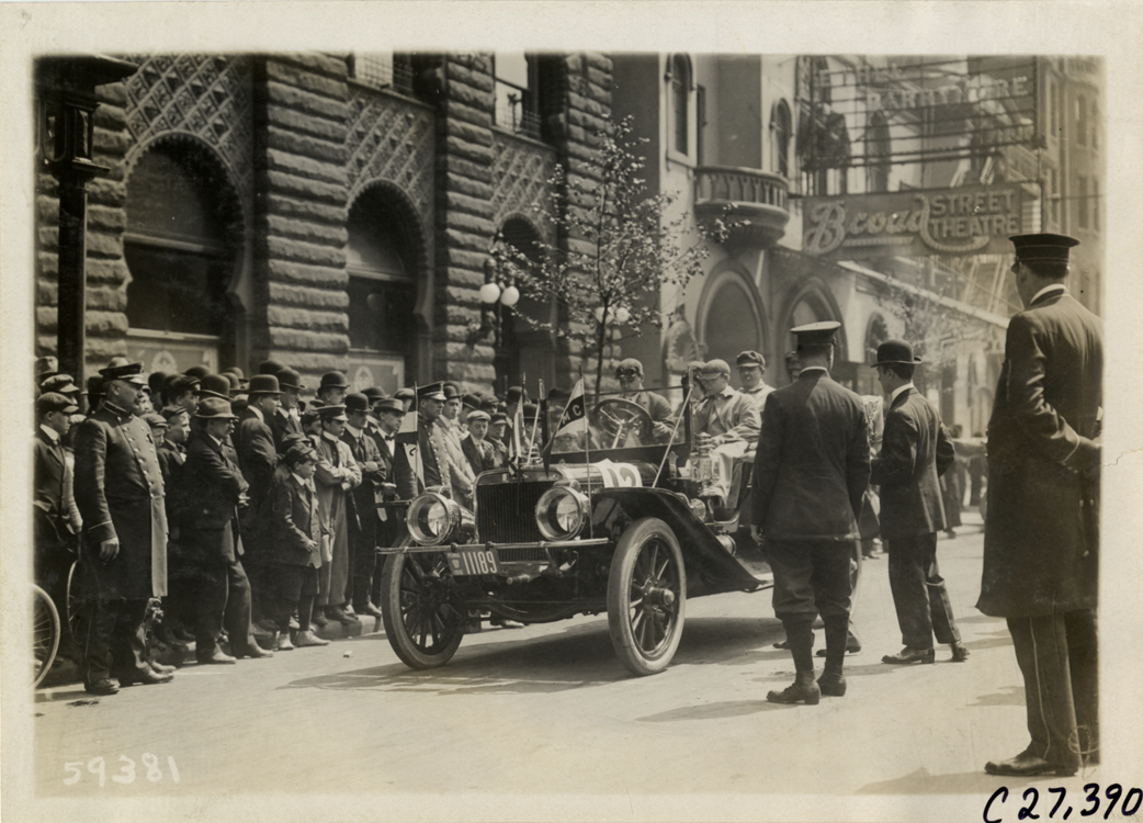 Motorists in automobile at Philadelphia, Pennsylvania, 1910 Quaker City Motor Club Roadability Run