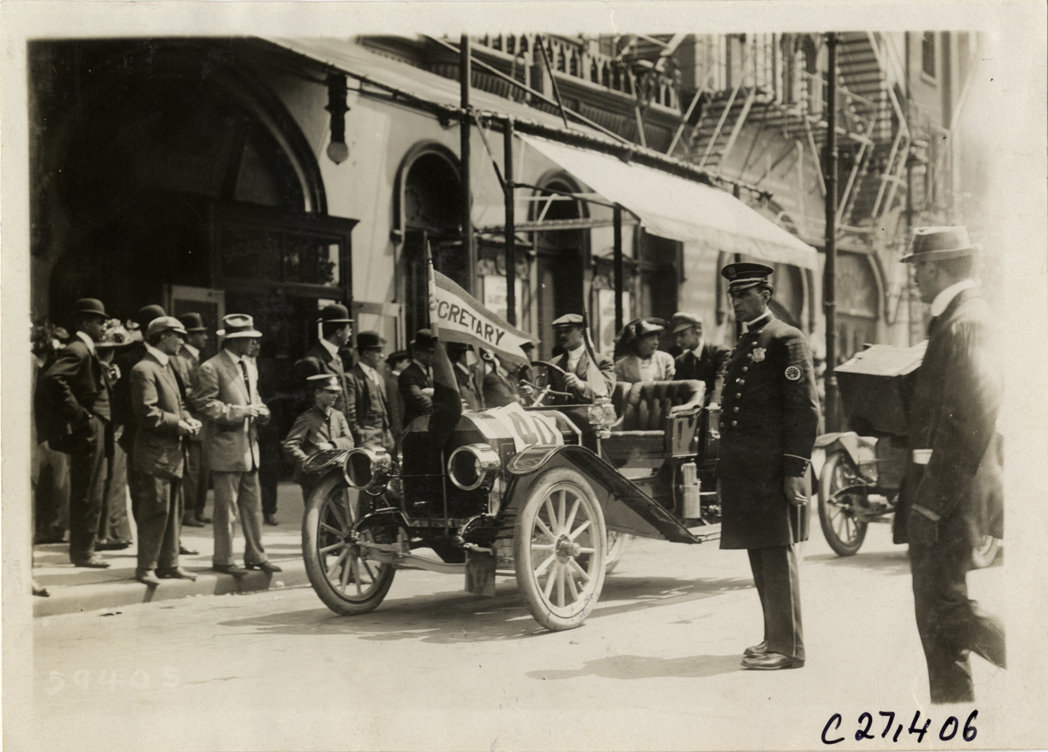 Motorists in automobile at Philadelphia, Pennsylvania, 1910 Quaker City Motor Club Roadability Run