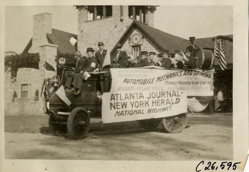 Band playing in Gramm-Logan truck, Atlanta, Georgia, 1909 New York-Atlanta Good Roads Tour