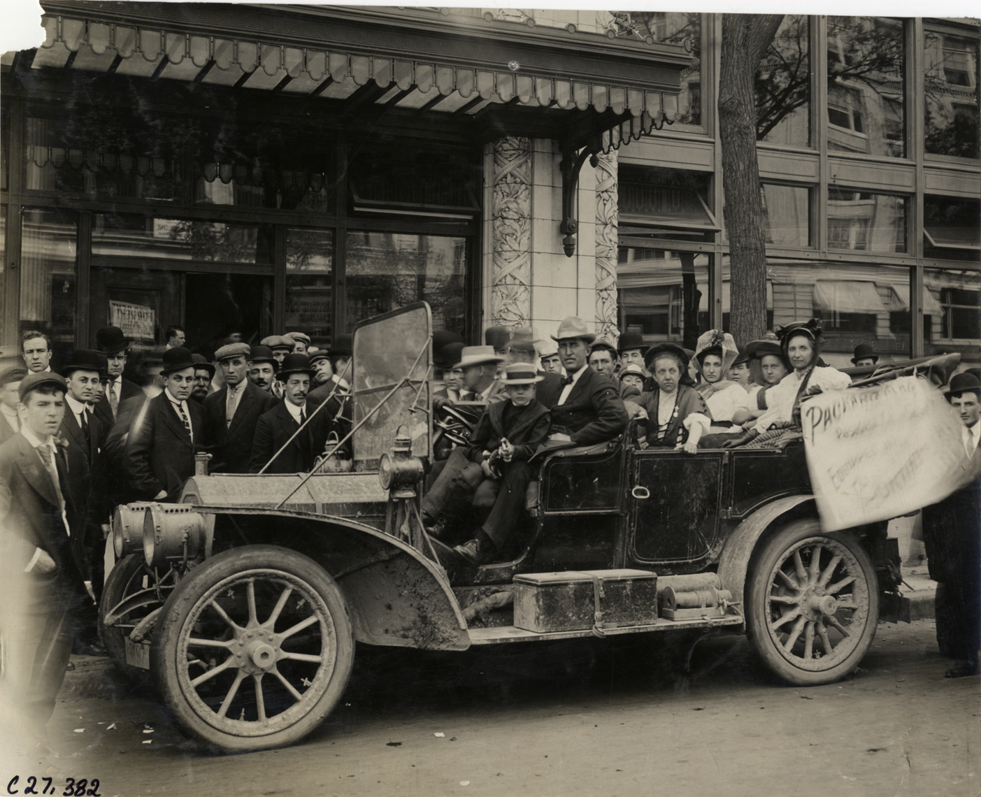 J.M. Murdock and family posing in Packard automobile, 1908 Packard Transcontinental Tour