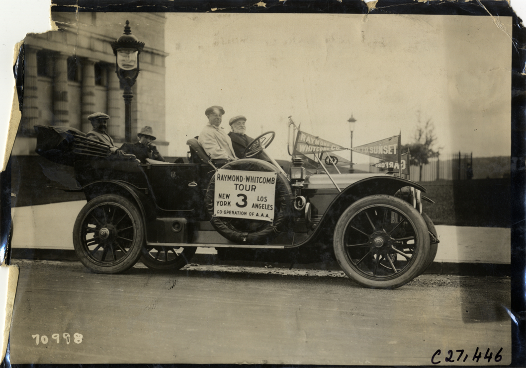 Motorists posing in Garford automobile, 1911 Raymond-Whitcomb Tour