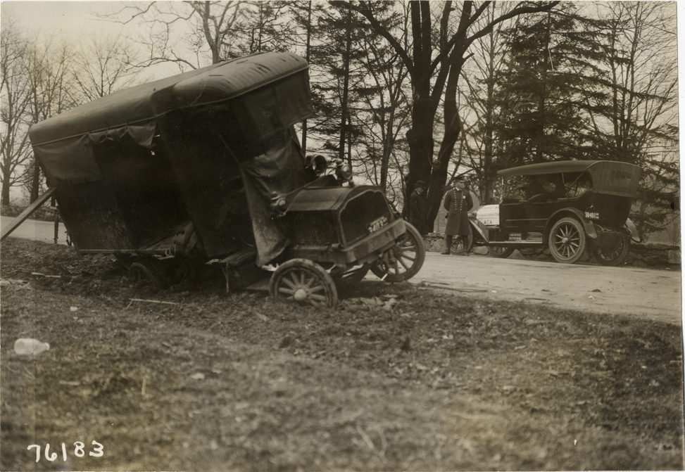 Disabled truck on roadside, 1913 Overman tires 10,000 mile demonstration