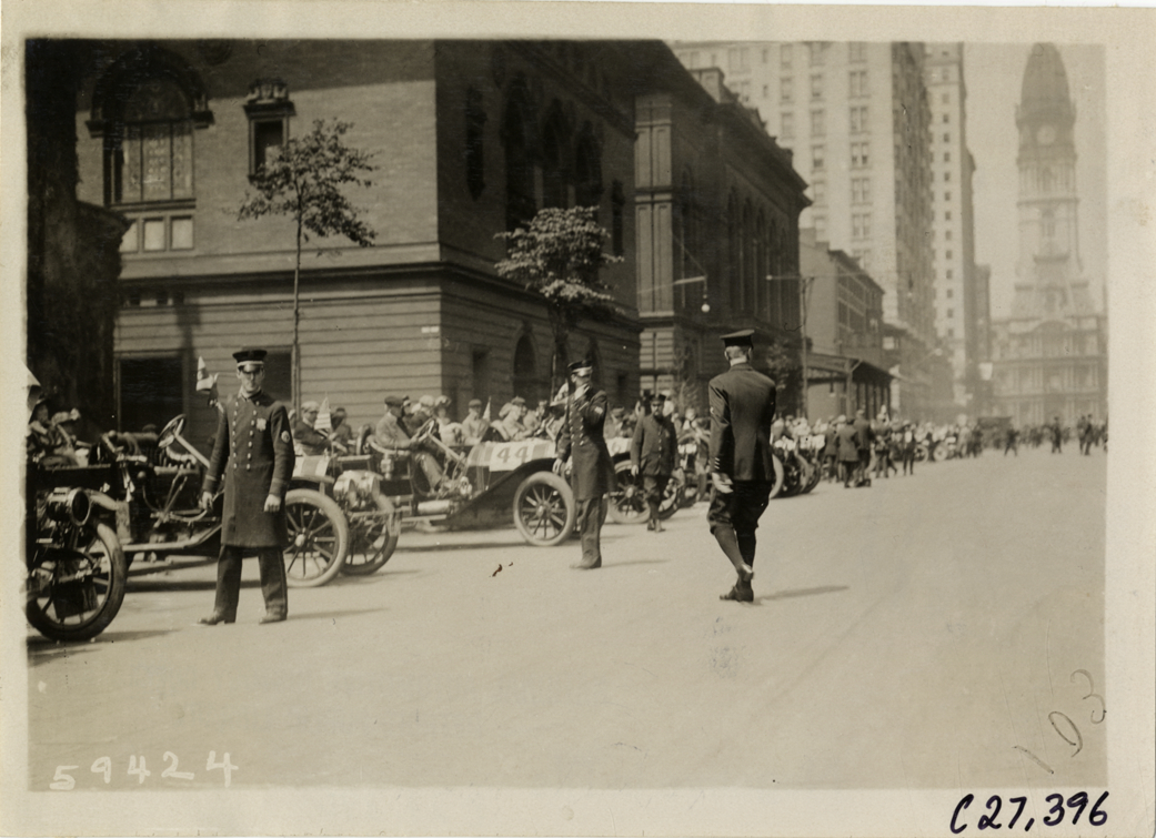 Automobiles lined up in street at Philadelphia, Pennsylvania, 1910 Quaker City Motor Club Roadability Run