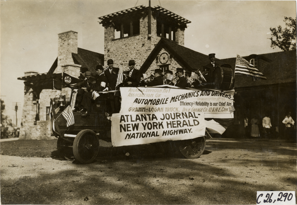 Band playing in Gramm-Logan truck, Atlanta, Georgia, 1909 New York-Atlanta Good Roads Tour