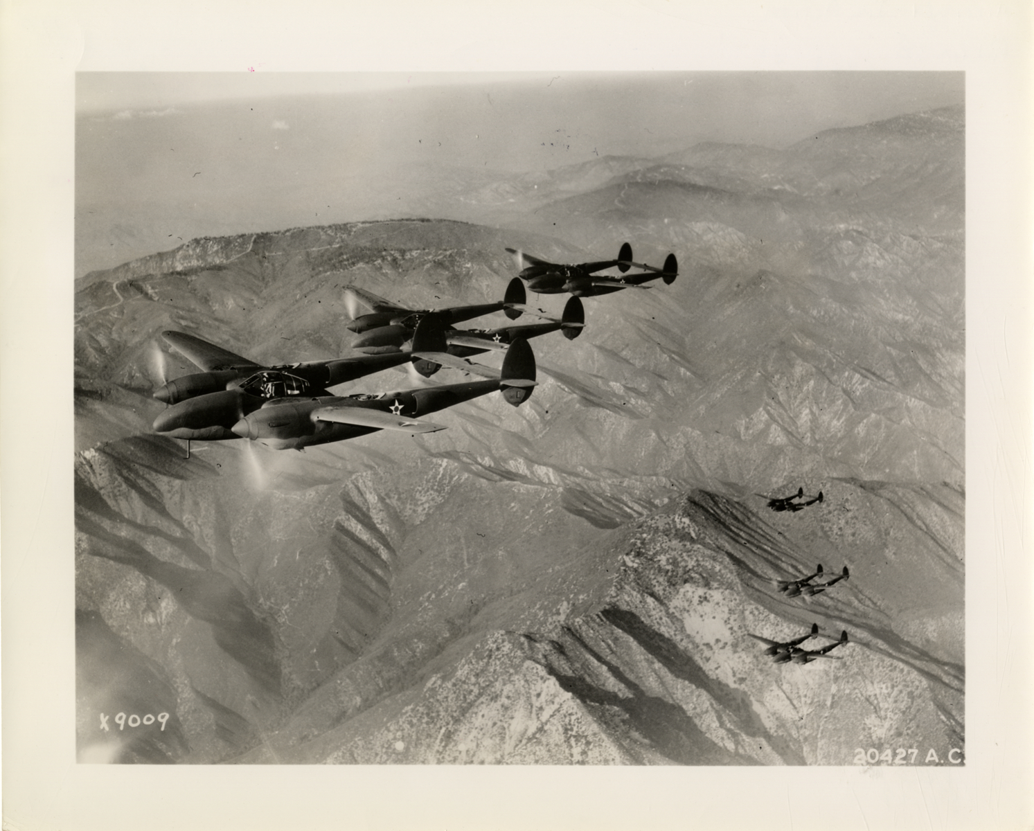 P-38 Lightning fighter planes in formation