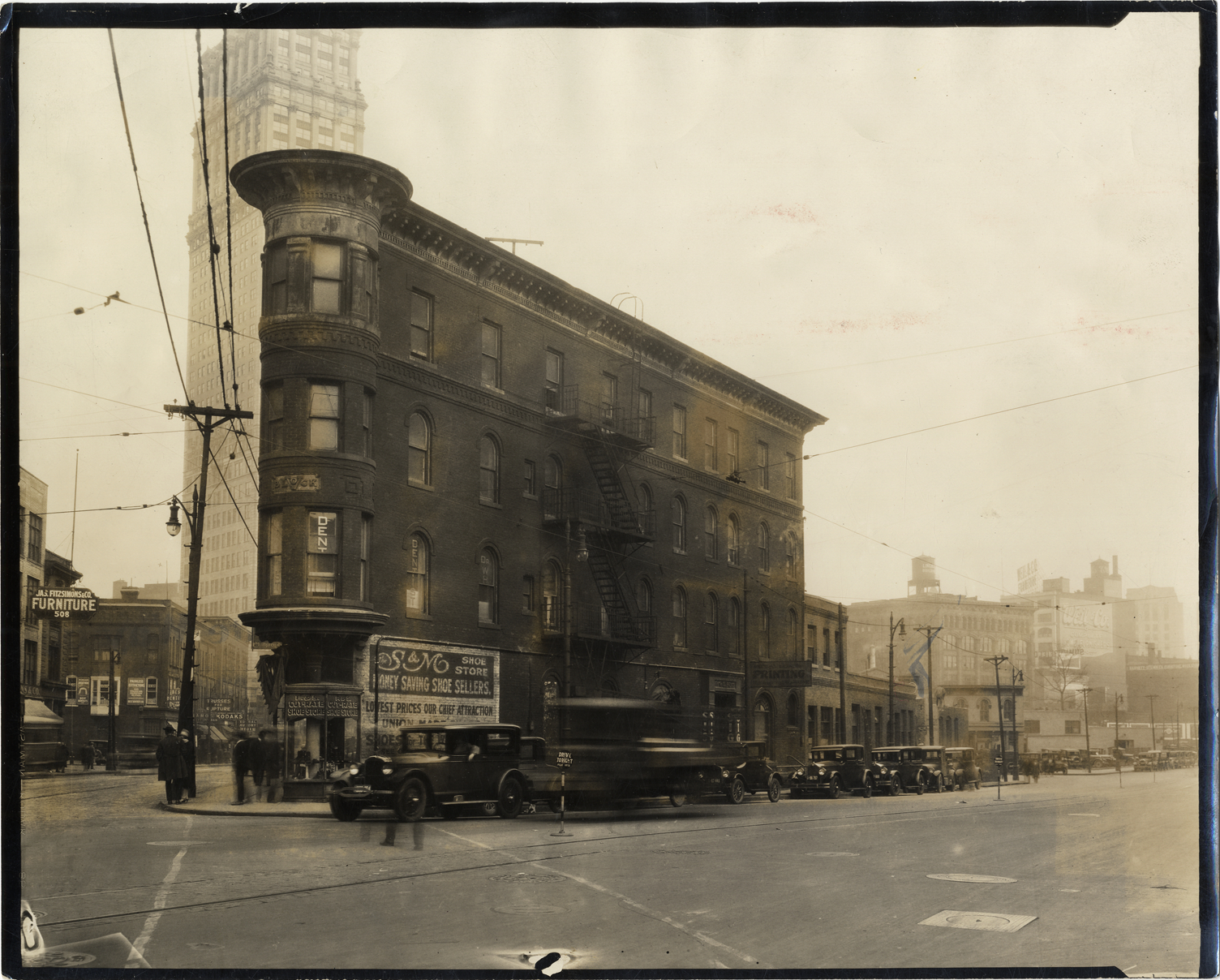 Commercial building at the corner of Grand River and Cass Avenues