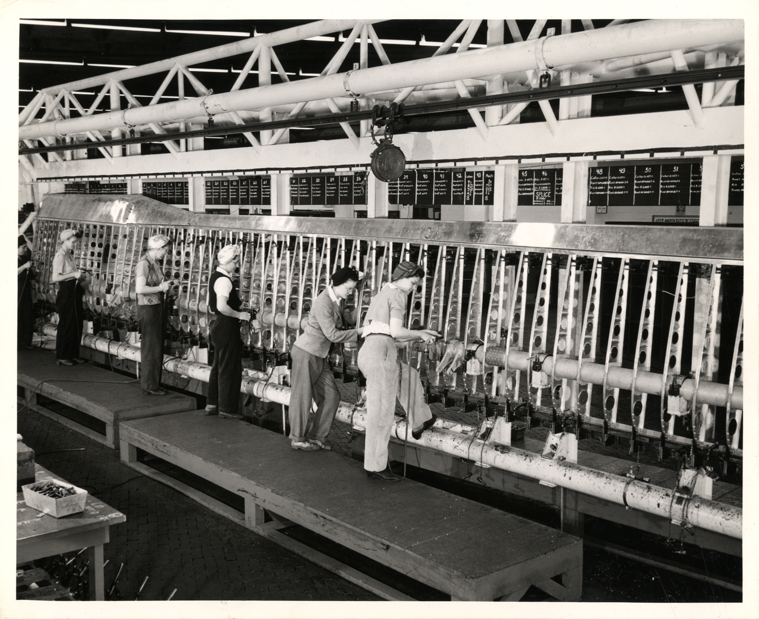 Women workers assembling wing flaps for B-29 Superfortress bomber