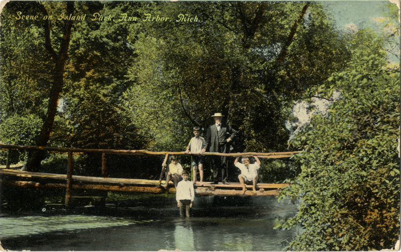 Man and children on bridge, Island Park, Ann Arbor, Michigan
