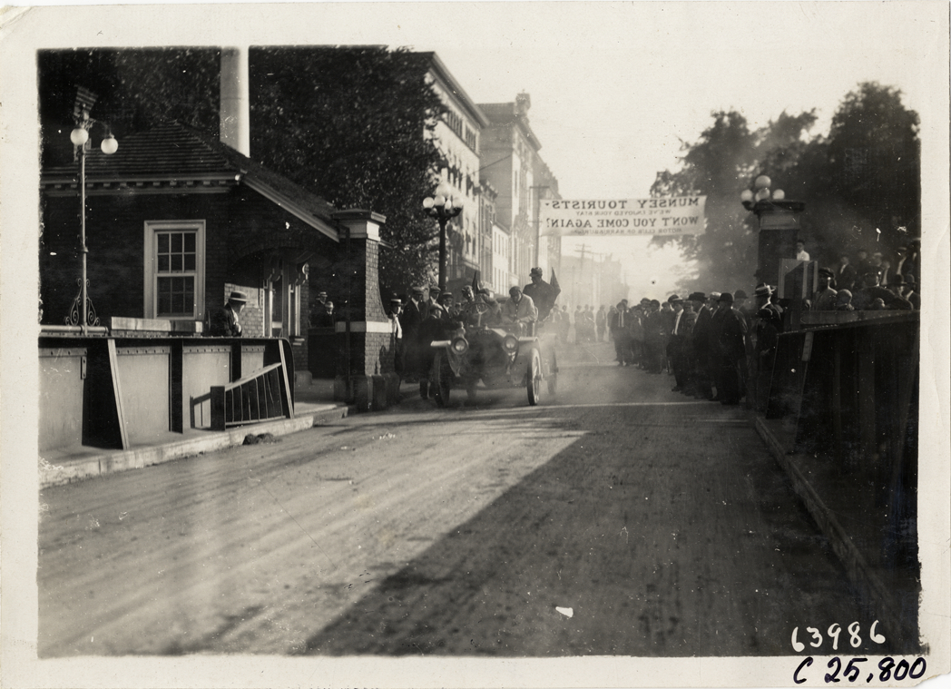 Motorists in Cino automobile approaching bridge at Harrisburg, Pennsylvania, 1910 Munsey Historic Tour