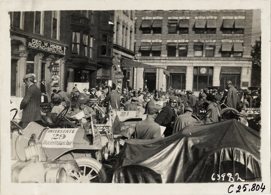 Motorists with automobiles in street, 1910 Munsey Historic Tour
