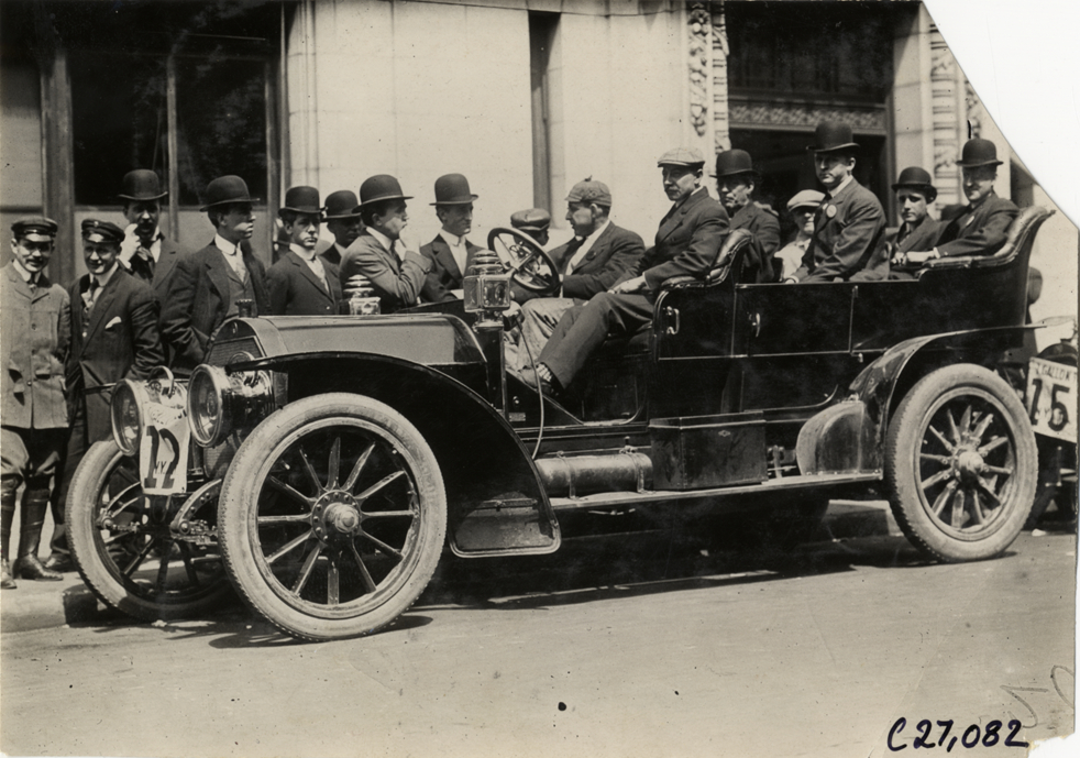Motorists posing in automobile, 1909 New York Economy Contest