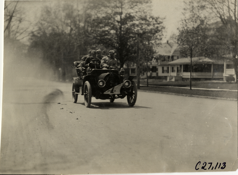 Motorists in Franklin automobile, 1909 New York Economy Contest