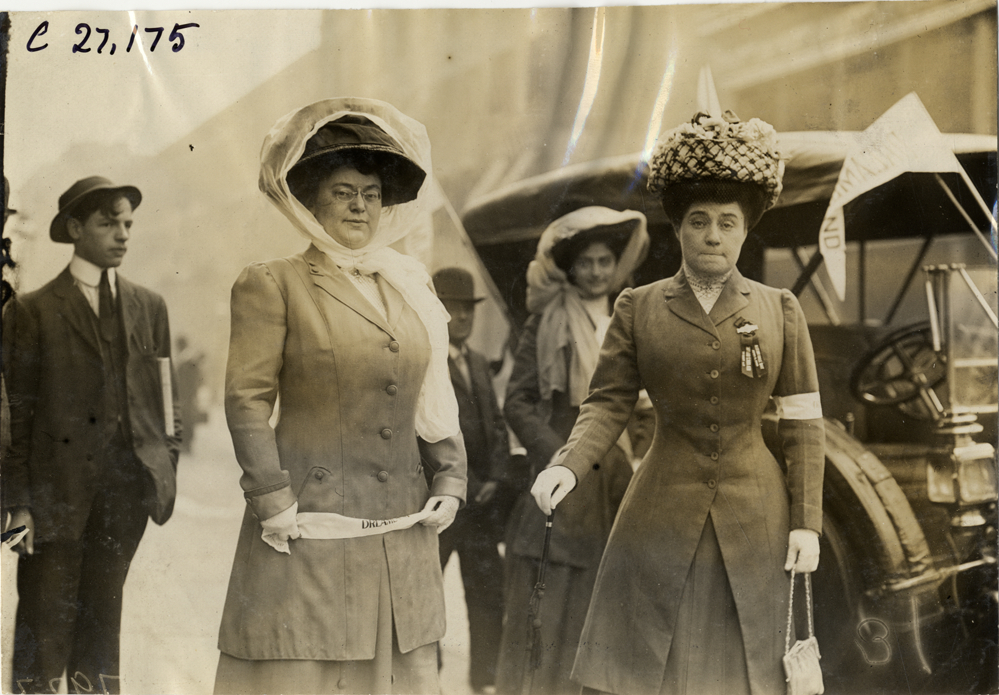 Women posing in front of automobile, 1909 New York Orphans Day outing