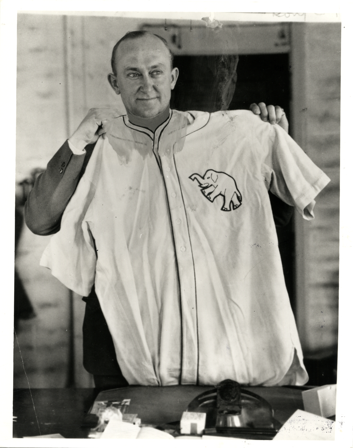 Ty Cobb holding Philadelphia Athletics jersey