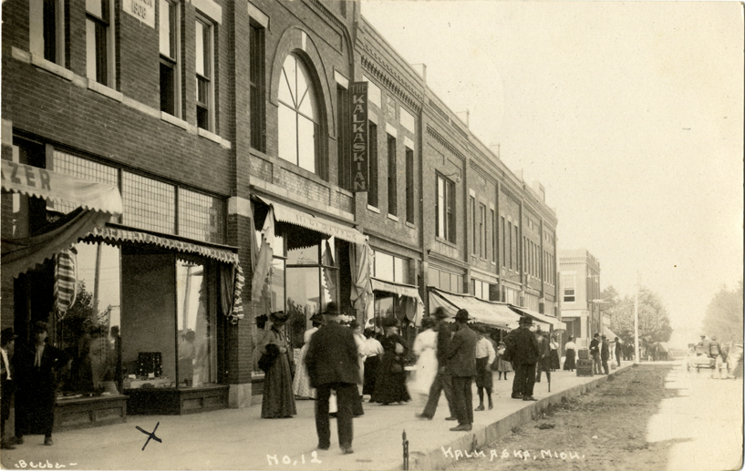 Pedestrians on sidewalk, Kalkaska, Michigan