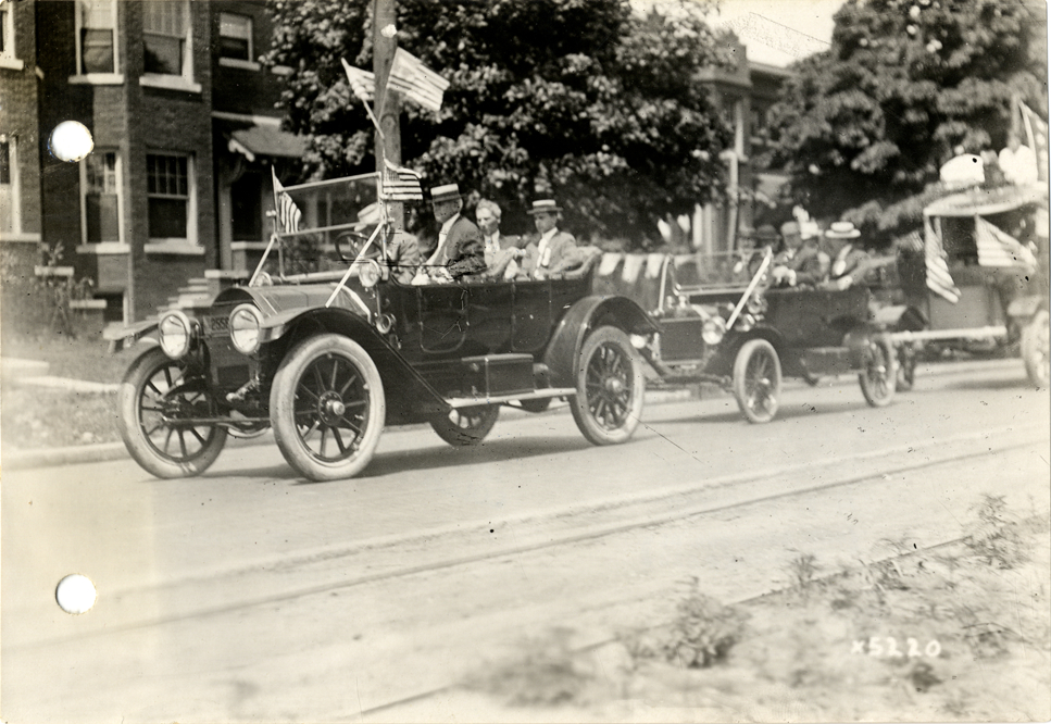 Motorists in 1912-1913 Cadillac Model 30 automobile, 1912 Cadillaqua parade