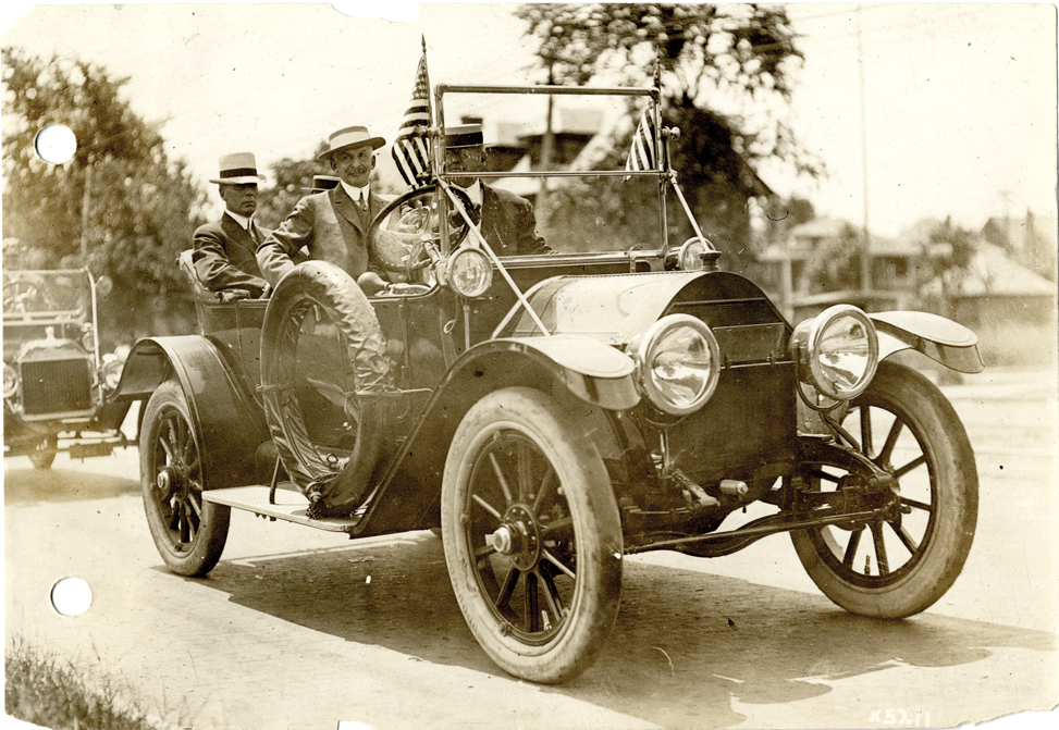 Motorists in 1912-1913 Cadillac Model 30 automobile, 1912 Cadillaqua parade