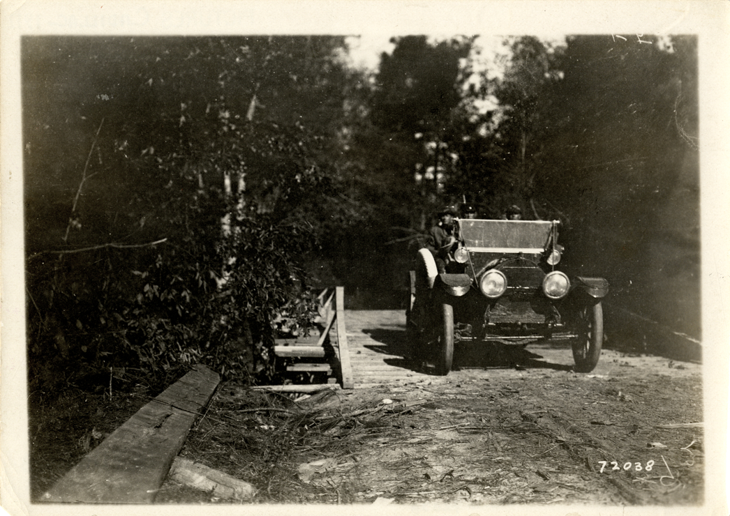 W.H. Lyle and motorists in 1912 Cadillac automobile, 1911 Glidden Tour
