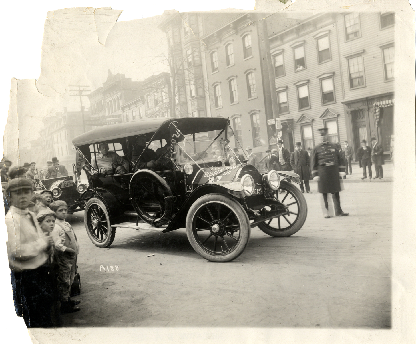 W.H. Lyle and motorists in 1912 Cadillac automobile, 1911 Glidden Tour