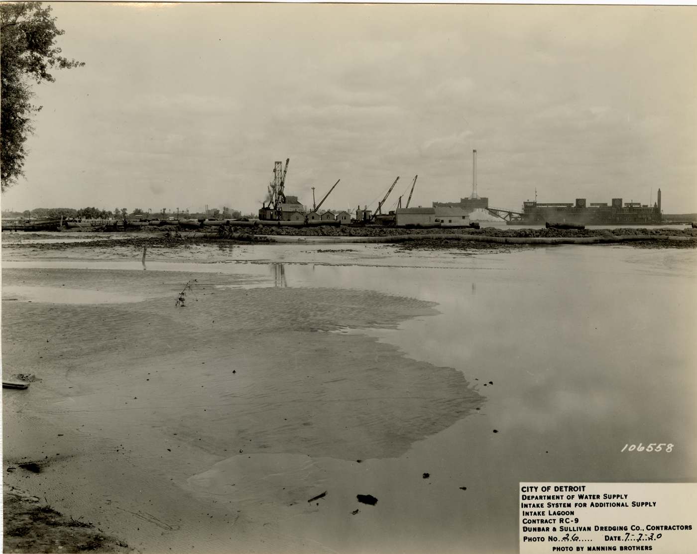 Dredge "New Jersey" excavating from river channel, Detroit water supply system