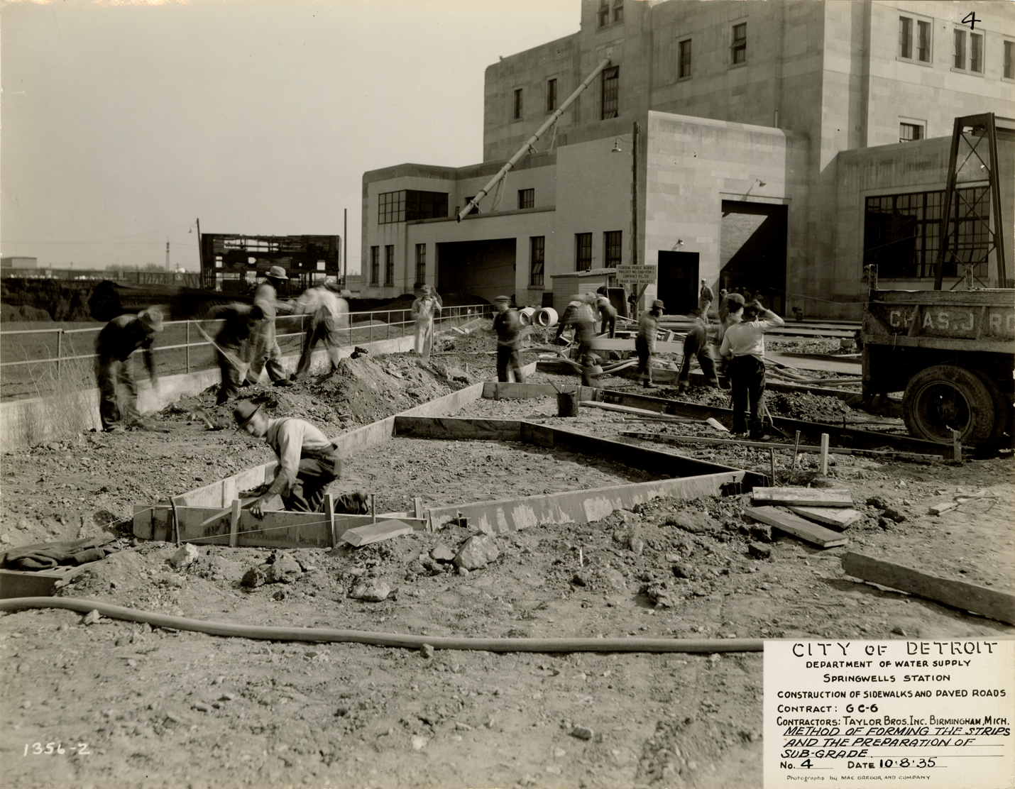 Workers constructing road, Springwells Station, Detroit water supply system