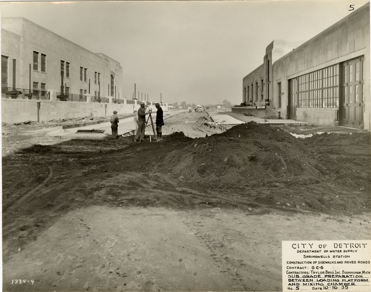 Workers constructing road, Springwells Station, Detroit water supply system