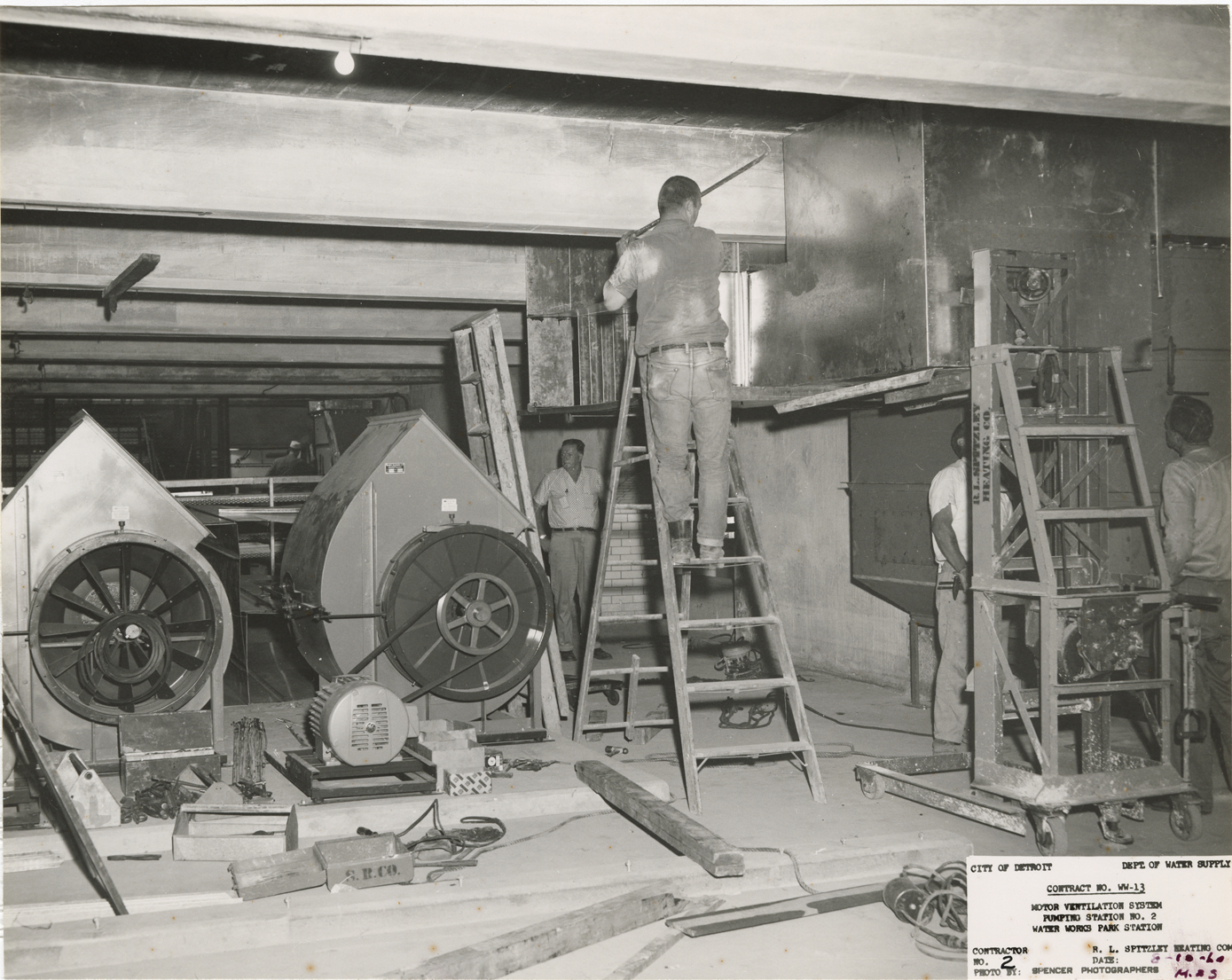 Workers in fan room, pumping station no. 2, Waterworks Park, Detroit water supply system