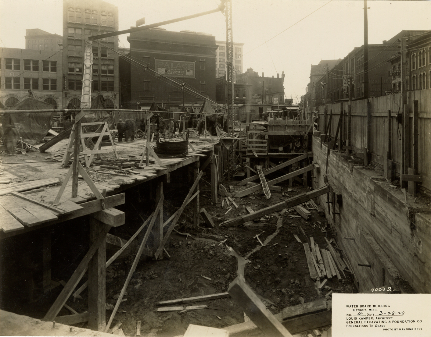 Workers building foundation for Water Board building