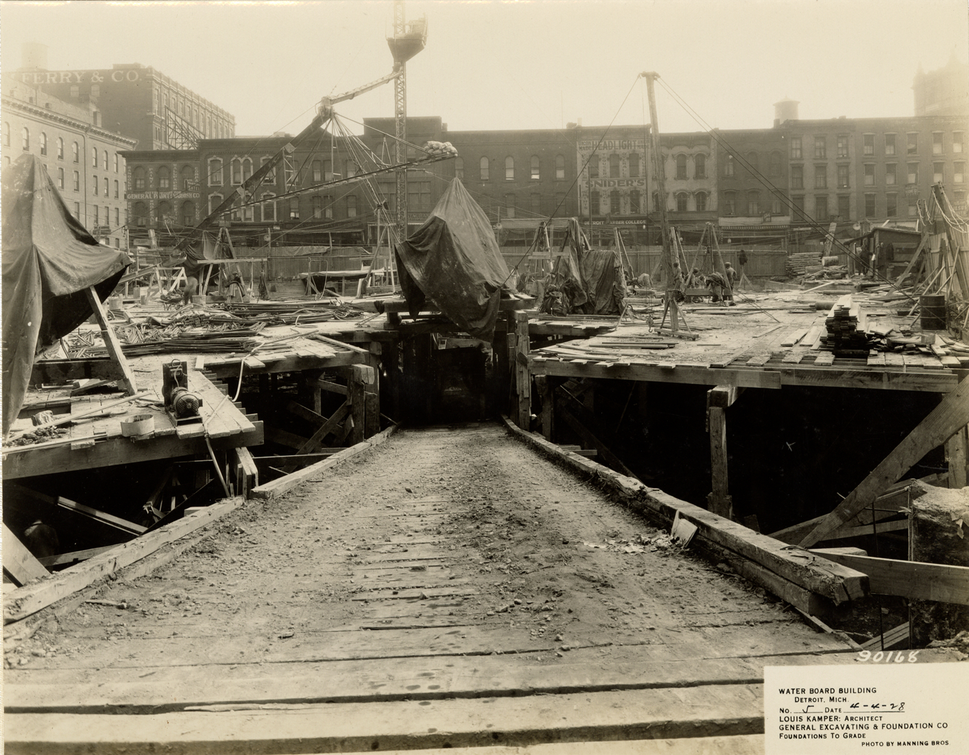 Workers building foundation for Water Board building