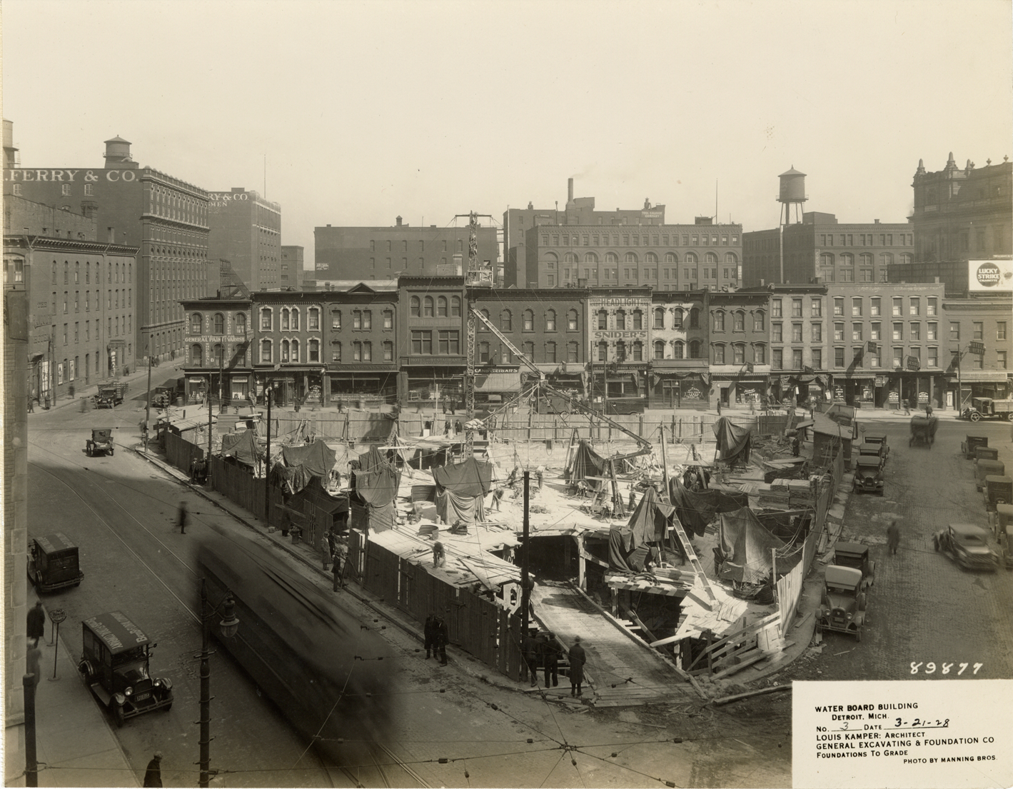 Workers building foundation for Water Board building