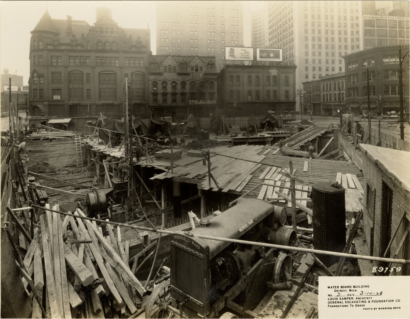 Workers building foundation for Water Board building