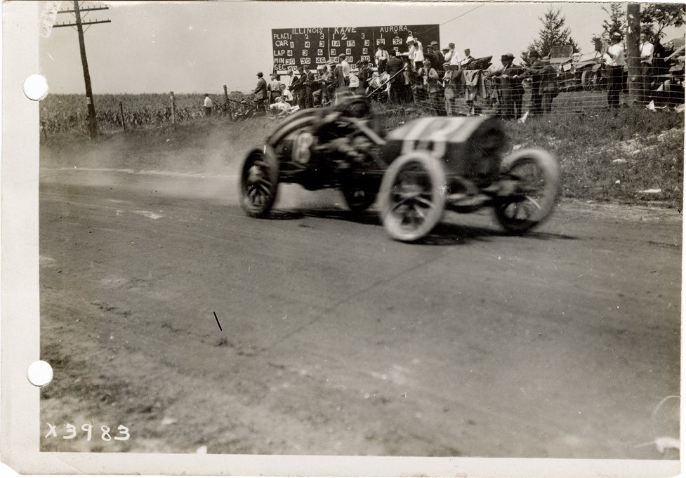 Hugo W. Ogren driving a Colby racecar, 1911 Elgin National Stock ...