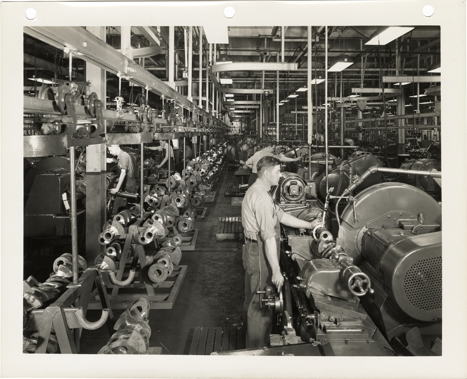 Workers on assembly line for production of Packard Rolls-Royce Merlin XX engines