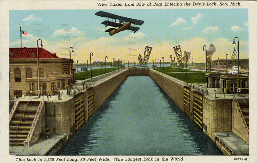 Airplane flying over Davis Lock, Soo Locks, Sault Ste. Marie, Michigan