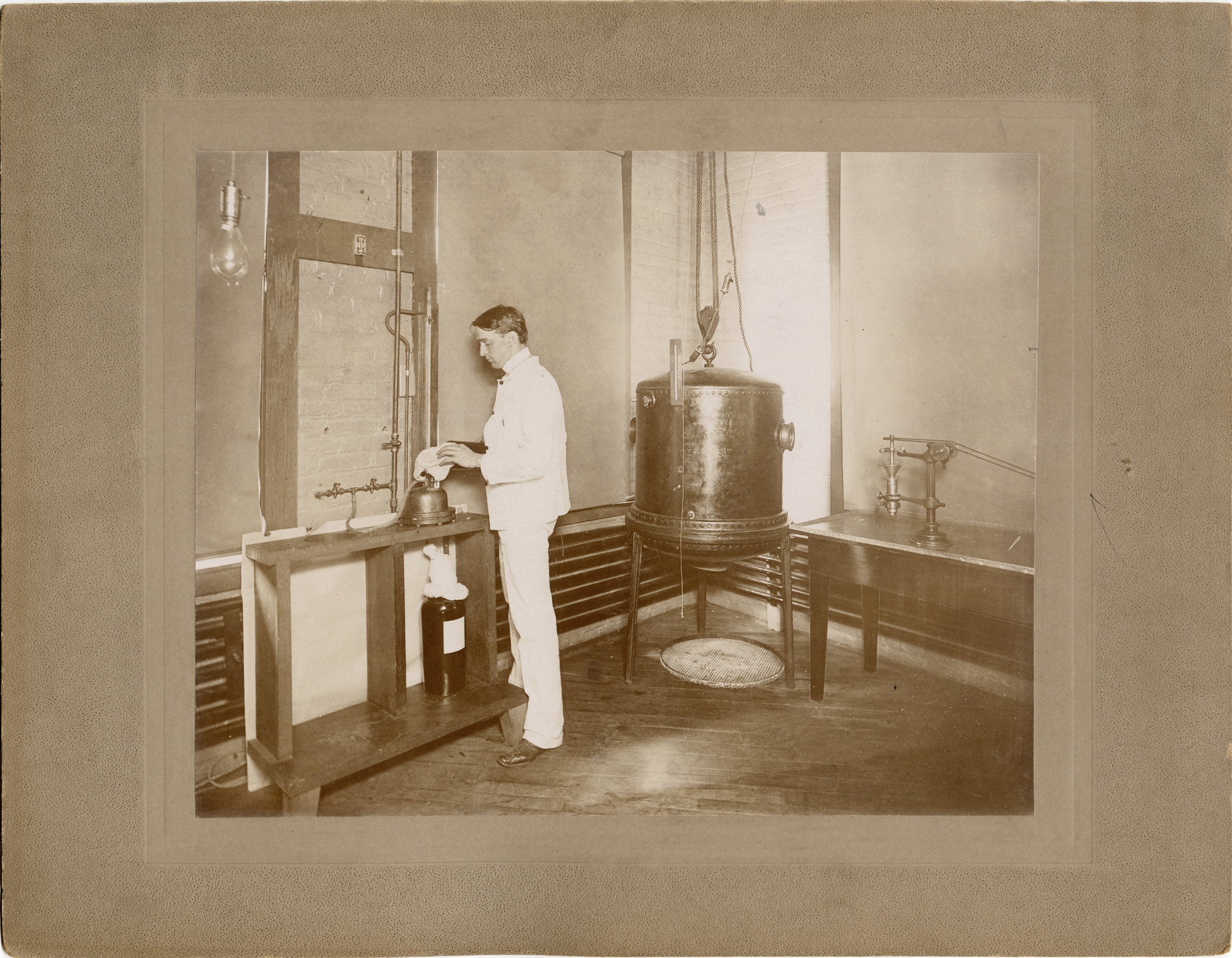 Worker in the aseptic room, Parke, Davis & Company
