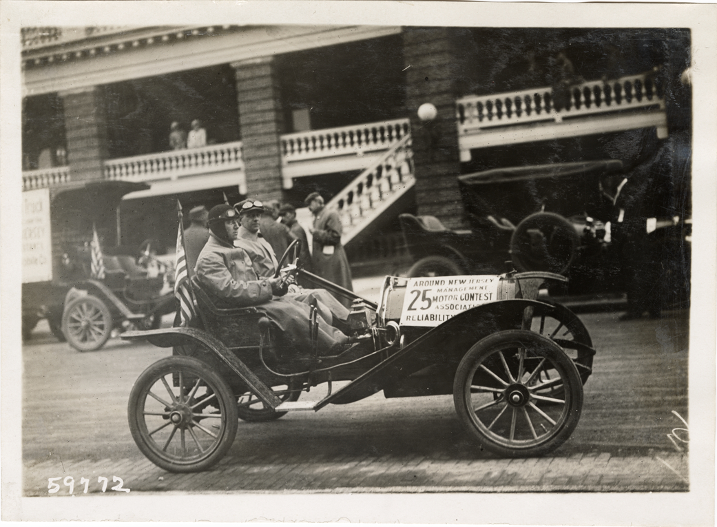 Motorists posing in Hupmobile automobile, 1910 New Jersey Reliability Run