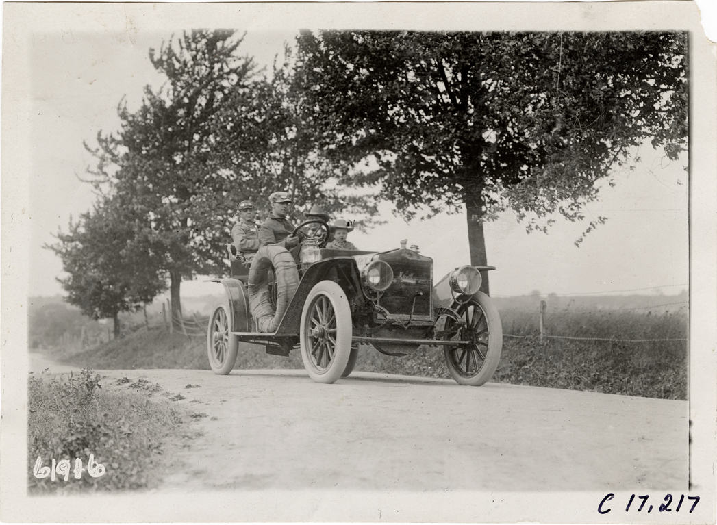 Motorists posing in Maxwell automobile, 1910 Abernathy Kids New York to Oklahoma Tour