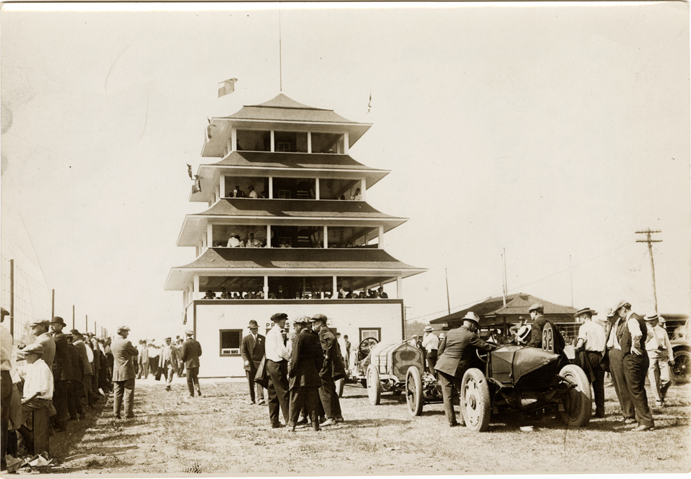 Marmon and National racecars in front of judges' stand, Indianapolis Speedway