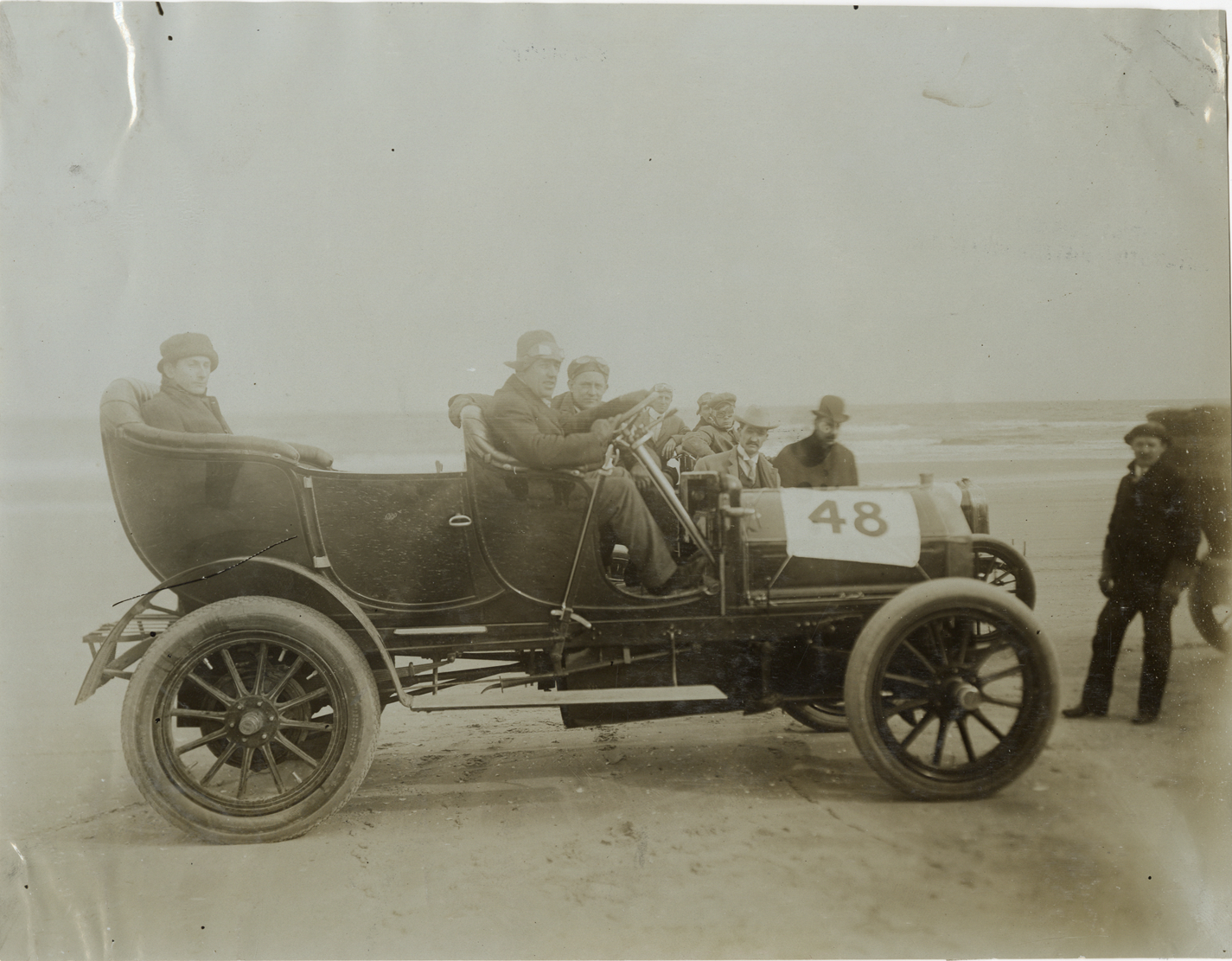 Motorists posing in 1906 Pierce-Arrow automobile