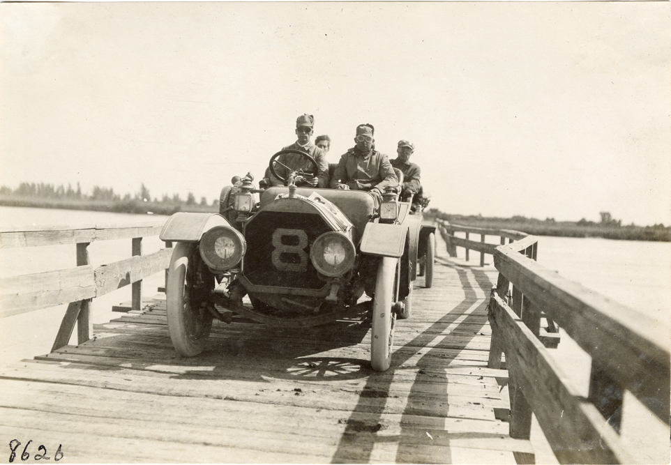 Motorists in Pierce-Arrow automobile crossing the North Platte River Bridge, 1909 Glidden Tour