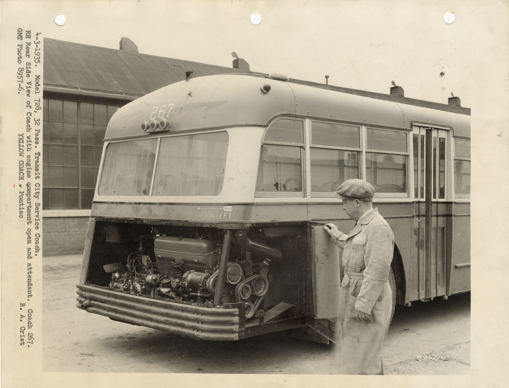 Man opening engine compartment, Yellow Truck and Coach bus