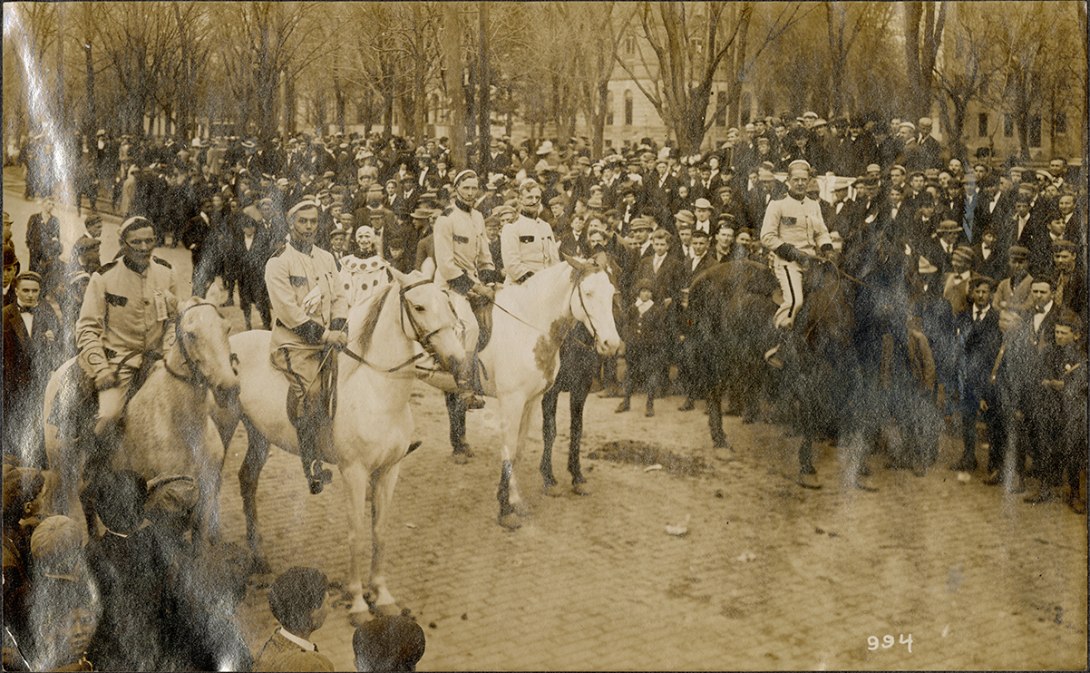 Students posing on horseback in parade, University of Michigan Triennial County Fair