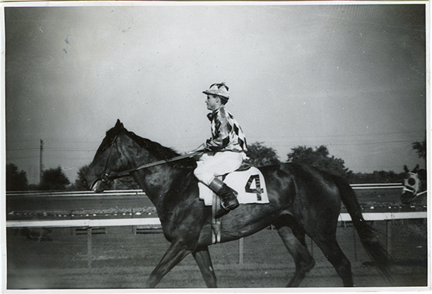 Jockey Jerome Heater riding horse, Hazel Park Raceway
