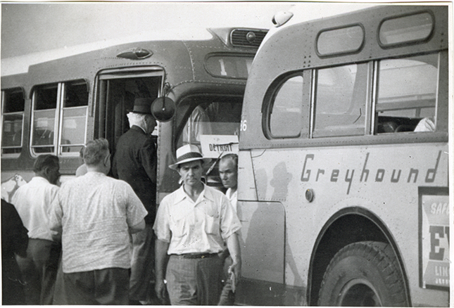 Passengers boarding Greyhound buses, Hazel Park Raceway