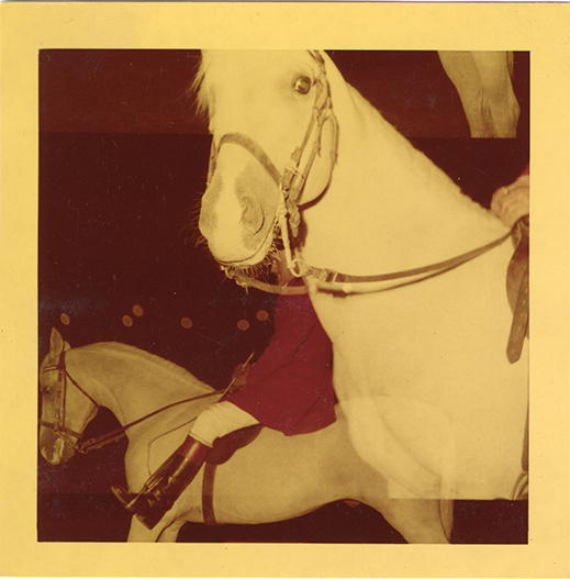 Steward James E. Stolte posing on horse "Nar," Michigan Racing Association racetrack