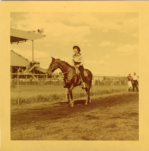 Woman riding horse, Hazel Park Raceway